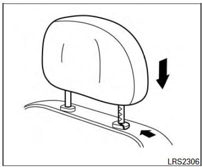 Pour l'abaisser, maintenez le bouton de verrouillage enfoncé, puis poussez l'appuie-tête vers le bas.