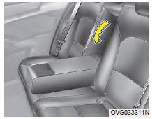 Pour utiliser l'accoudoir, sortez-le du