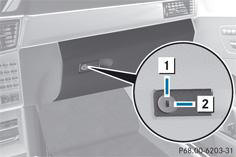 Vous pouvez déverrouiller et verrouiller la boîte à gants uniquement avec la